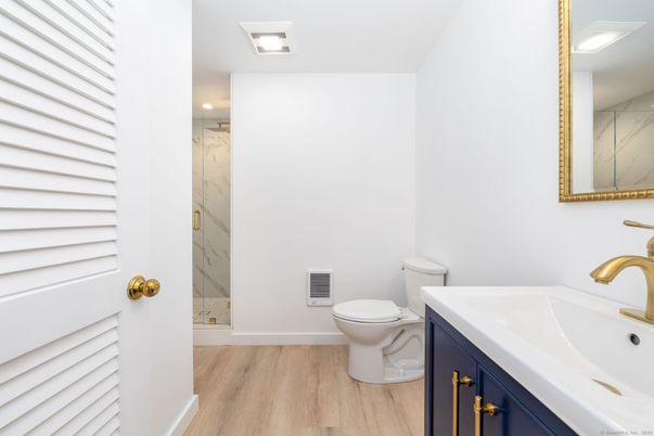 Bathroom, Interior, Marble Walls, Recessed Lighting, Wood Texture Flooring