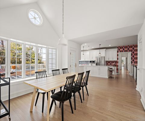 Dining room, Interior, Kitchen, Pendant Lights, Recessed Lighting, Stainless Steel Appliances, Wood Texture Flooring