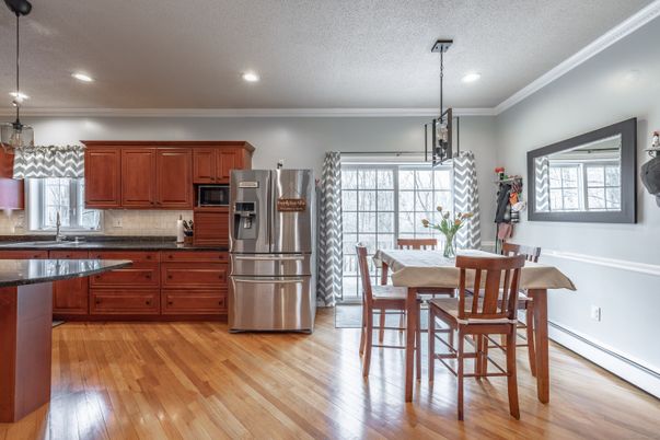 Dining room, Interior, Kitchen, Pendant Lights, Recessed Lighting, Stainless Steel Appliances, Wood Texture Flooring