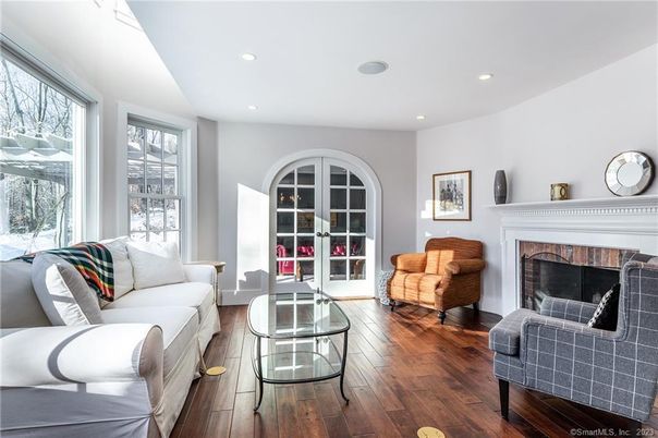 Fireplace, Interior, Living room, Recessed Lighting, Wood Texture Flooring