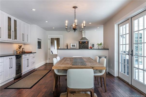 Chandelier, Dining room, Fireplace, Interior, Recessed Lighting, Wood Texture Flooring
