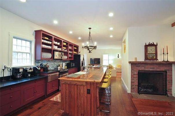 Chandelier, Fireplace, Interior, Kitchen, Pendant Lights, Recessed Lighting, Wood Texture Flooring