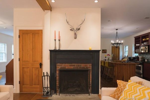 Chandelier, Fireplace, Interior, Kitchen, Pendant Lights, Recessed Lighting, Wood Texture Flooring