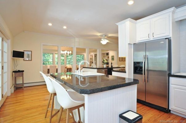 Dining room, Interior, Kitchen, Recessed Lighting, Stainless Steel Appliances, Wood Texture Flooring