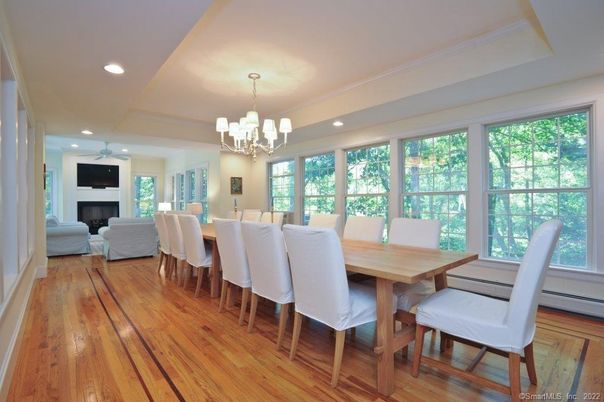 Chandelier, Dining room, Fireplace, Interior, Living room, Recessed Lighting, Wood Texture Flooring