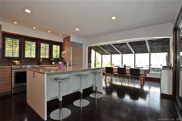 Dining room, Interior, Kitchen, Recessed Lighting, Stainless Steel Appliances, Wood Texture Flooring