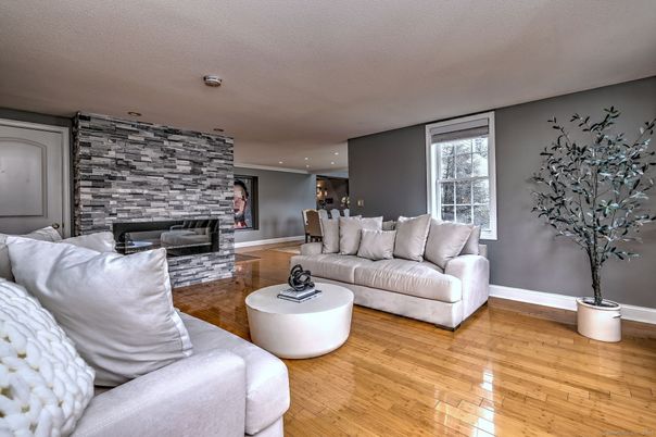 Dining room, Fireplace, Interior, Living room, Recessed Lighting, Stone Walls, Wood Texture Flooring