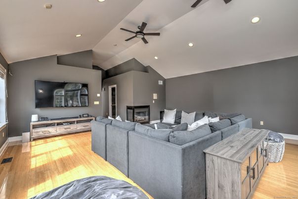 Fireplace, Interior, Living room, Recessed Lighting, Wood Texture Flooring