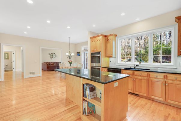 Chandelier, Interior, Kitchen, Pendant Lights, Recessed Lighting, Stainless Steel Appliances, Wood Texture Flooring