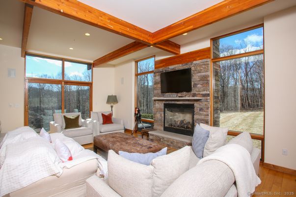 Fireplace, Interior, Living room, Recessed Lighting, Stone Walls, Wooden Beams, Wood Texture Flooring