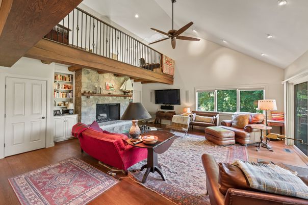 Fireplace, Interior, Living room, Recessed Lighting, Stone Walls, Wood Texture Flooring