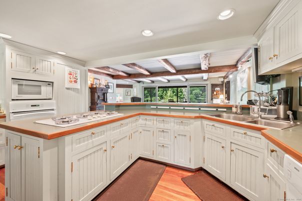 Chandelier, Interior, Kitchen, Recessed Lighting, Stainless Steel Appliances, Wooden Beams, Wood Texture Flooring