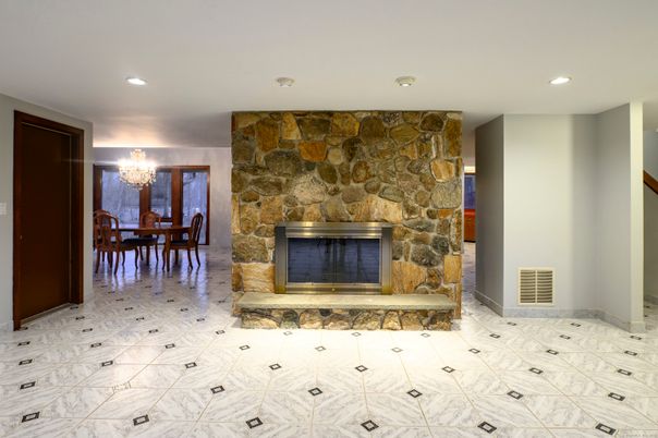 Chandelier, Dining room, Fireplace, Interior, Marble, Recessed Lighting, Stone Walls