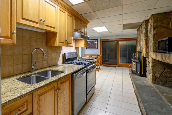 Fireplace, Interior, Kitchen, Recessed Lighting, Stone Walls