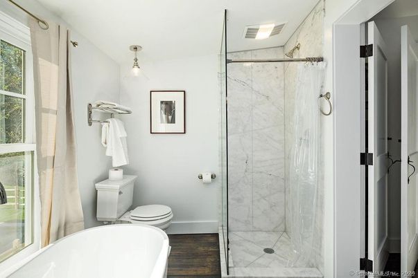 Bathroom, Glass Shower, Interior, Marble Walls, Wood Texture Flooring