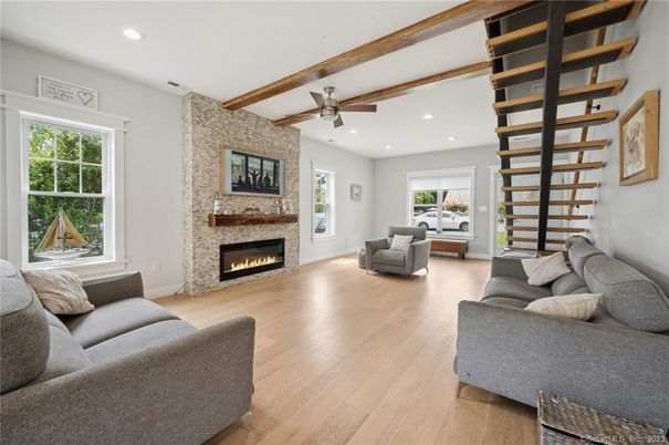 Fireplace, Interior, Living room, Recessed Lighting, Stone Walls, Wooden Beams, Wood Texture Flooring