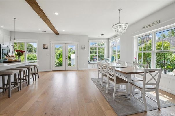 Chandelier, Dining room, Interior, Pendant Lights, Recessed Lighting, Wooden Beams, Wood Texture Flooring