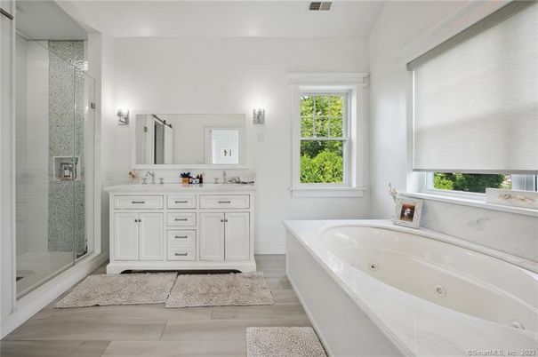 Bathroom, Dual Sink Vanities, Glass Shower, Interior, Wood Texture Flooring