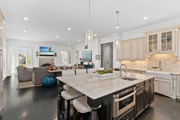 Fireplace, Interior, Kitchen, Living room, Pendant Lights, Recessed Lighting, Stainless Steel Appliances, Wood Texture Flooring