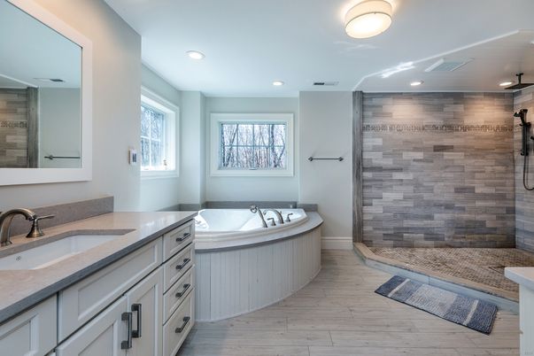 Bathroom, Dual Sink Vanities, Glass Shower, Interior, Recessed Lighting, Wood Texture Flooring