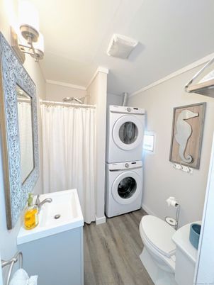Bathroom, Interior, Utility Closets, Washer, Wood Texture Flooring