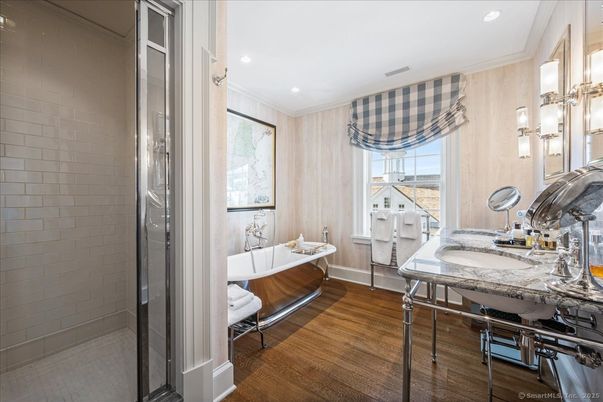 Bathroom, Dual Sink Vanities, Free Standing Baths, Interior, Recessed Lighting, Wood Texture Flooring