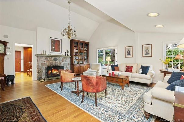 Chandelier, Fireplace, Interior, Living room, Pendant Lights, Recessed Lighting, Wood Texture Flooring