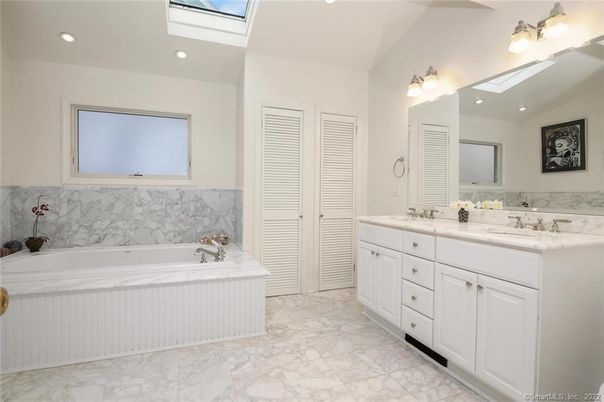 Bathroom, Dual Sink Vanities, Interior, Marble, Marble Walls, Recessed Lighting