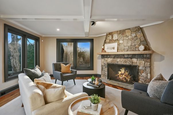 Fireplace, Interior, Living room, Recessed Lighting, Stone Walls, Wood Texture Flooring