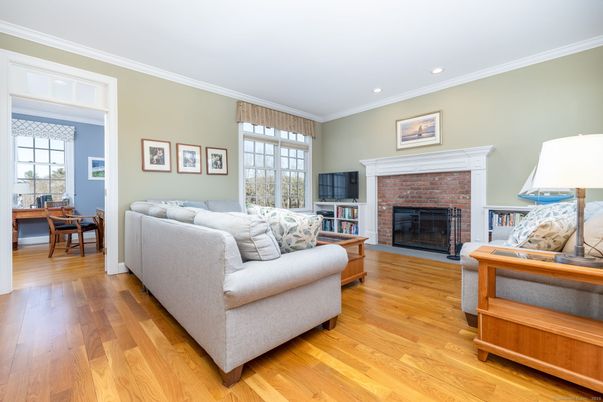 Dining room, Fireplace, Interior, Living room, Recessed Lighting, Wood Texture Flooring