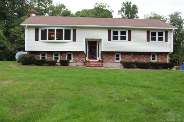 Backyard, Exterior, Facade, Brick Facade, Raised Ranch