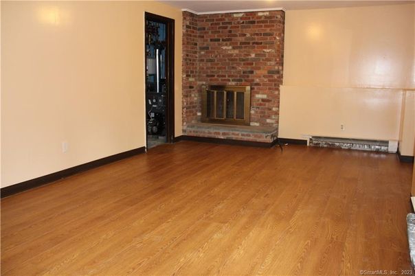 Empty room, Fireplace, Interior, Stone Walls, Wood Texture Flooring