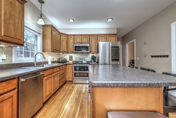 Interior, Kitchen, Pendant Lights, Recessed Lighting, Stainless Steel Appliances, Wood Texture Flooring
