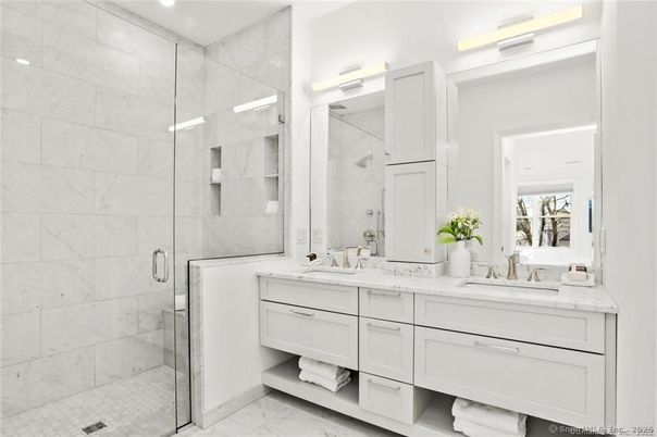 Bathroom, Dual Sink Vanities, Glass Shower, Interior, Marble Walls, Recessed Lighting