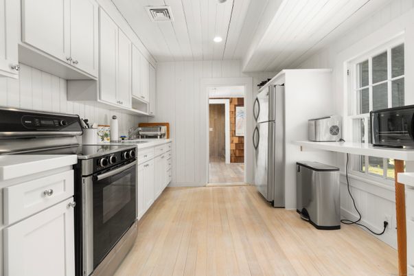 Interior, Kitchen, Recessed Lighting, Stainless Steel Appliances, Wood Texture Flooring
