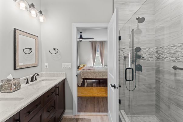 Bathroom, Dual Sink Vanities, Glass Shower, Interior, Wood Texture Flooring