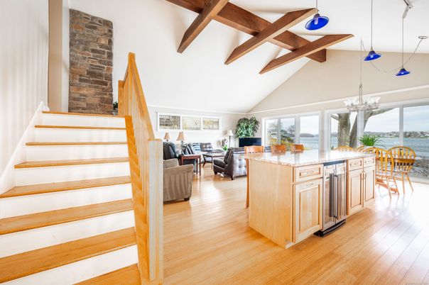 Chandelier, Dining room, Interior, Living room, Pendant Lights, Stone Walls, Water, Wooden Beams, Wood Texture Flooring