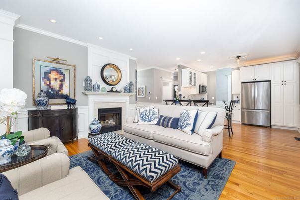 Fireplace, Interior, Kitchen, Living room, Pendant Lights, Recessed Lighting, Stainless Steel Appliances, Wood Texture Flooring