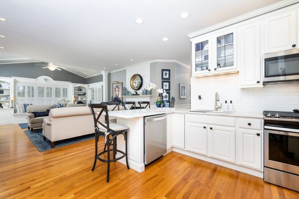Dining room, Interior, Kitchen, Living room, Recessed Lighting, Stainless Steel Appliances, Wood Texture Flooring