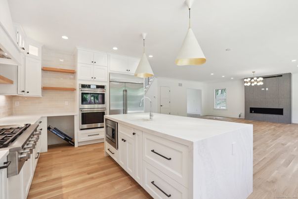 Interior, Kitchen, Pendant Lights, Recessed Lighting, Stainless Steel Appliances, Wood Texture Flooring