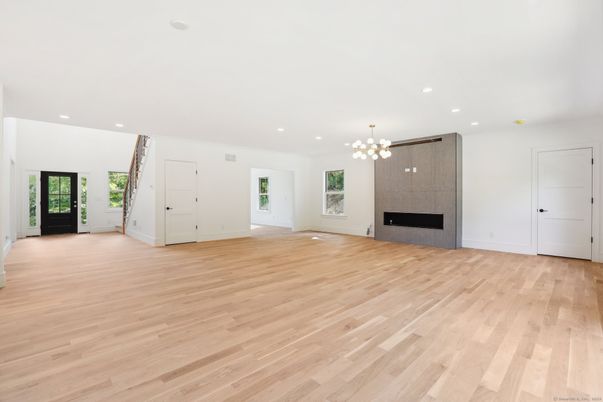 Empty room, Fireplace, Interior, Pendant Lights, Recessed Lighting, Wood Texture Flooring