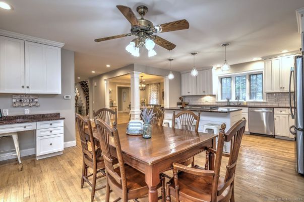 Dining room, Interior, Kitchen, Pendant Lights, Recessed Lighting, Stainless Steel Appliances, Wood Texture Flooring