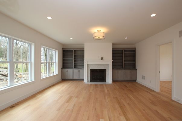 Empty room, Fireplace, Interior, Recessed Lighting, Wood Texture Flooring
