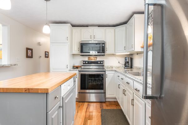 Interior, Kitchen, Pendant Lights, Stainless Steel Appliances, Wood Texture Flooring