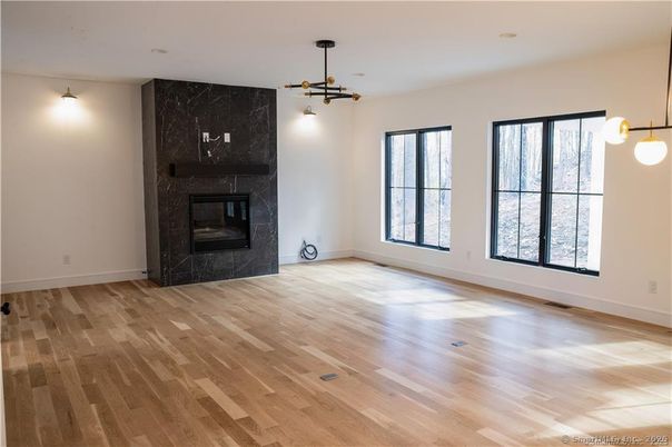 Empty room, Fireplace, Interior, Pendant Lights, Wood Texture Flooring