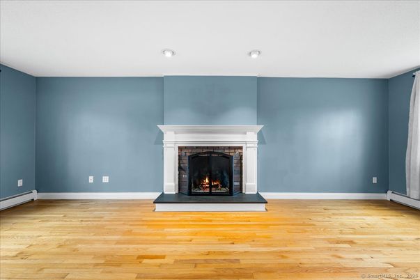 Empty room, Fireplace, Interior, Recessed Lighting, Wood Texture Flooring