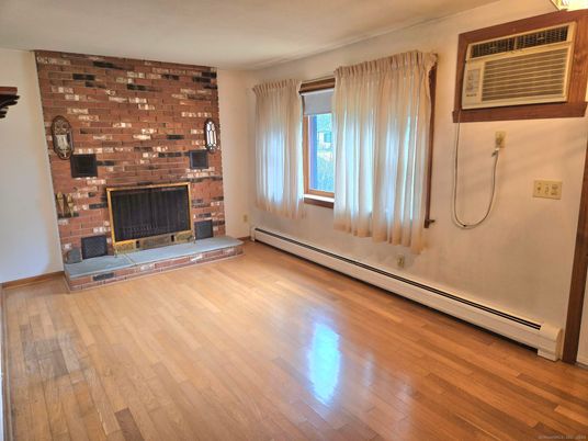 Empty room, Fireplace, Interior, Stone Walls, Wood Texture Flooring