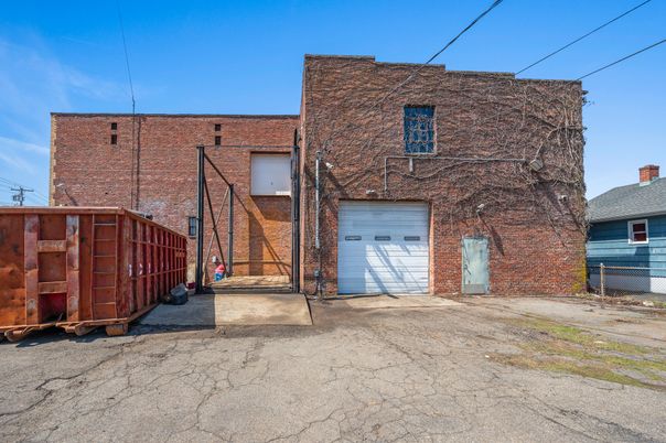 Attached, Exterior, Facade, Brick Facade, None