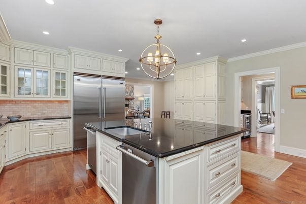 Chandelier, Interior, Kitchen, Recessed Lighting, Stainless Steel Appliances, Wood Texture Flooring