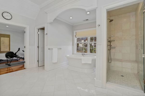 Bathroom, Free Standing Baths, Glass Shower, Interior, Recessed Lighting, Wood Texture Flooring